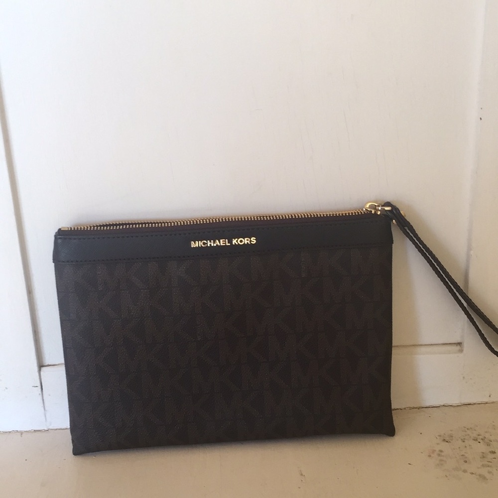 Micheal Kors extra large wristlet.